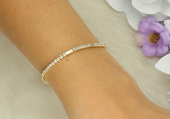 Bransoletka tenisowa Nomination Italy z kolekcji Petit Sparkle. Srebro 925 pozłacane 18K złotem, zdobiona cyrkoniami. Regulowana długość 16,5–19,5 cm. Oryginalna biżuteria idealna na prezent! (3).jpg